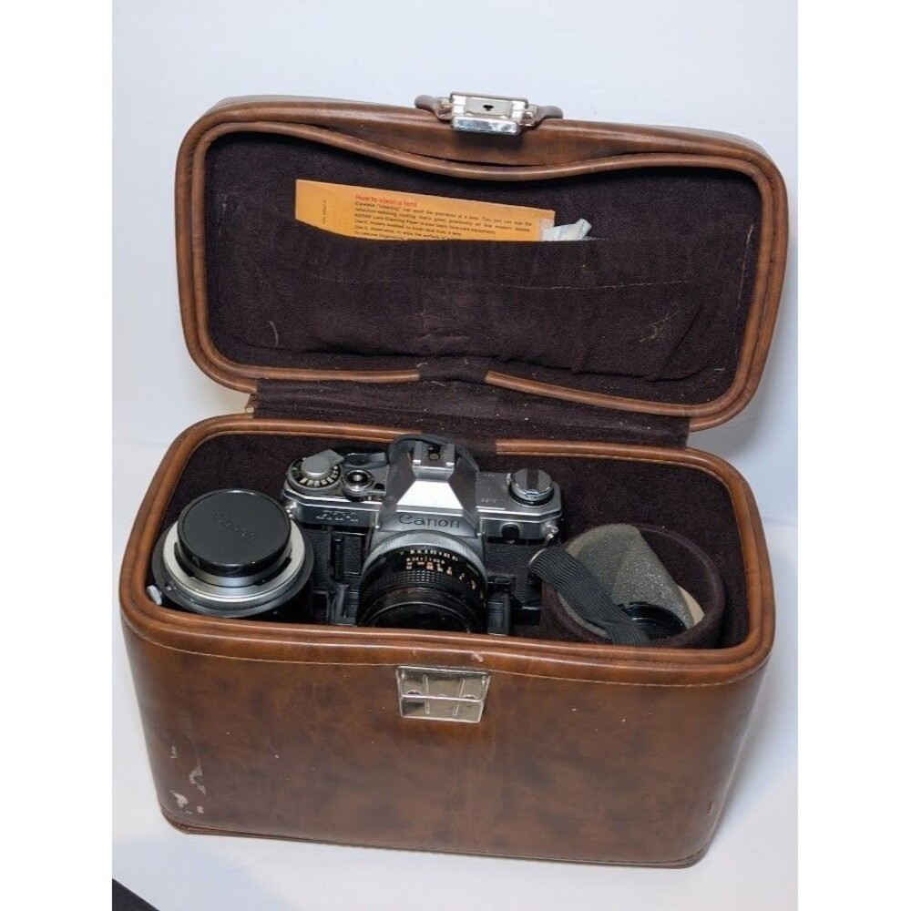 Canon AT-1 35mm Film Camera + 50mm f/1.8 Lens and Vivitar 75-205mm f/3.8 lens